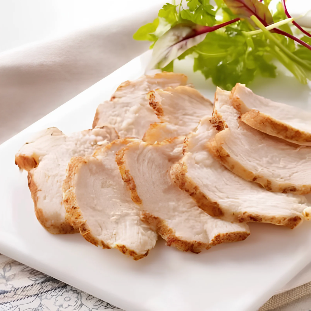 Tranche de filet de poulet roti cuit surgelée